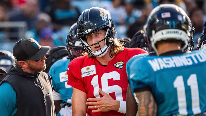Jacksonville Jaguars head coach Liam Coen talks with Jacksonville Jaguars quarterback Trevor Lawrence (16) between plays before an NFL scrimmage at EverBank Stadium Friday August 1, 2025, in Jacksonville, Fla. [Doug Engle/Florida Times-Union]