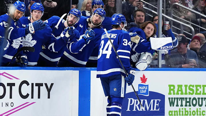 Oct 19, 2024; Toronto, Ontario, CAN; Toronto Maple Leafs center Auston Matthews (34) celebrates with teammates after scoring a goal against the New York Rangers during the third  period at Scotiabank Arena. Mandatory Credit: Nick Turchiaro-Imagn Images