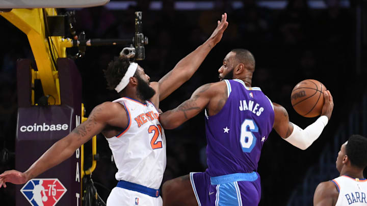 Feb 5, 2022; Los Angeles, California, USA; New York Knicks center Mitchell Robinson (23) defends a pass by Los Angeles Lakers forward LeBron James (6) in the first quarter of the game at Crypto.com Arena. Mandatory Credit: Jayne Kamin-Oncea-Imagn Images Feb 5, 2022; Los Angeles, California, USA; New York Knicks center Mitchell Robinson (23) defends a pass by Los Angeles Lakers forward LeBron James (6) in the first quarter of the game at Crypto.com Arena. Mandatory Credit: Jayne Kamin-Oncea-Imagn Images