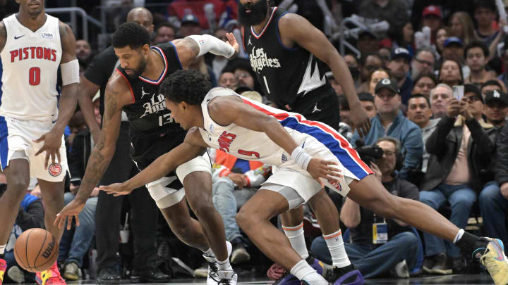 Feb 10, 2024; Los Angeles, California, USA; Los Angeles Clippers forward Paul George (13) steals the ball from Detroit Pistons forward Ausar Thompson (9) in the second half at Crypto.com Arena. Mandatory Credit: Jayne Kamin-Oncea-USA TODAY Sports Feb 10, 2024; Los Angeles, California, USA; Los Angeles Clippers forward Paul George (13) steals the ball from Detroit Pistons forward Ausar Thompson (9) in the second half at Crypto.com Arena. Mandatory Credit: Jayne Kamin-Oncea-USA TODAY Sports