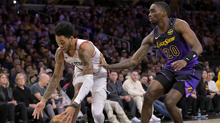 Jan 2, 2025; Los Angeles, California, USA; Portland Trail Blazers guard Anfernee Simons (1) looses control of the ball as he is chased dwn by Los Angeles Lakers guard Shake Milson in the first half at Crypto.com Arena. Mandatory Credit: Jayne Kamin-Oncea-Imagn Images Jan 2, 2025; Los Angeles, California, USA; Portland Trail Blazers guard Anfernee Simons (1) looses control of the ball as he is chased dwn by Los Angeles Lakers guard Shake Milson in the first half at Crypto.com Arena. Mandatory Credit: Jayne Kamin-Oncea-Imagn Images