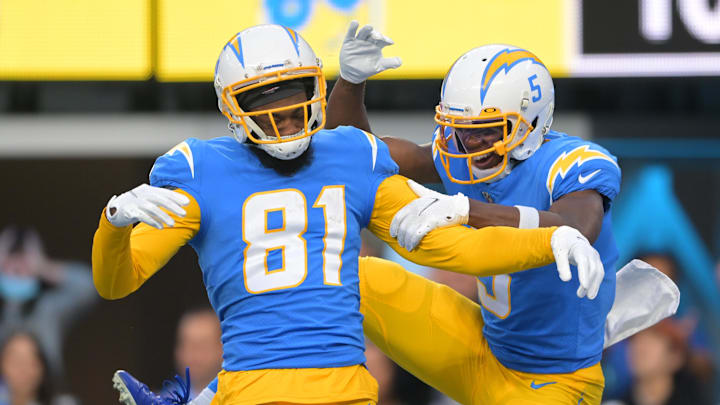 Jan 2, 2022; Inglewood, California, USA; Los Angeles Chargers wide receiver Josh Palmer (5) celebrates with wide receiver Mike Williams (81) after a 45 yard touchdown pass in the second half the game against the Denver Broncos at SoFi Stadium