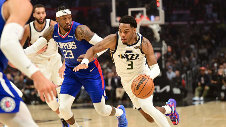 Mar 29, 2022; Los Angeles, California, USA; Utah Jazz guard Trent Forrest (3) is defended by Los Angeles Clippers forward Robert Covington (23) as he drives to the basket in the first half of the game at Crypto.com Arena. Mandatory Credit: Jayne Kamin-Oncea-USA TODAY Sports Mar 29, 2022; Los Angeles, California, USA; Utah Jazz guard Trent Forrest (3) is defended by Los Angeles Clippers forward Robert Covington (23) as he drives to the basket in the first half of the game at Crypto.com Arena. Mandatory Credit: Jayne Kamin-Oncea-USA TODAY Sports
