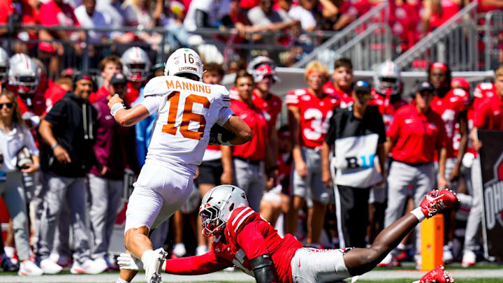 Ohio State Buckeyes defensive end Kenyatta Jackson Jr. (97) attempt to sack Texas Longhorns quarterback Arch Manning (16) in the second half at Ohio Stadium on Saturday, Aug. 30, 2025 in Columbus, Ohio.