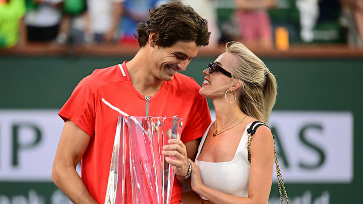 Taylor Fritz (USA) with his girlfriend Morgan Riddle after defeating Rafael Nadal (ESP) in the mens final at the BNP Paribas Open at the Indian Wells Tennis Garden. 