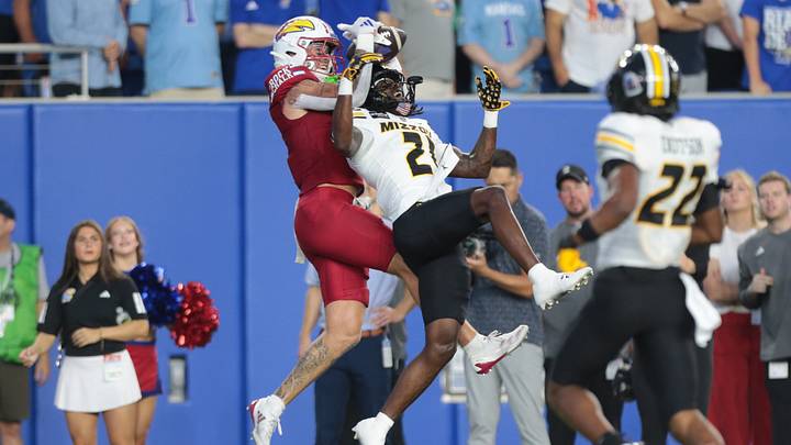 Kansas Jayhawks wide receiver Keaton Kubecka (3) is contested on a pass by Missouri Tigers cornerback Jahlil Florence (21) during the game inside David Booth Kansas Memorial Stadium on Sept. 11, 2026. Kansas Jayhawks wide receiver Keaton Kubecka (3) is contested on a pass by Missouri Tigers cornerback Jahlil Florence (21) during the game inside David Booth Kansas Memorial Stadium on Sept. 11, 2026.