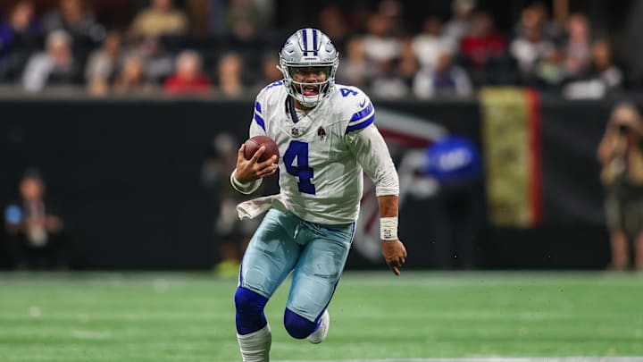 Nov 3, 2024; Atlanta, Georgia, USA; Dallas Cowboys quarterback Dak Prescott (4) scrambles against the Atlanta Falcons in the third quarter at Mercedes-Benz Stadium. Mandatory Credit: Brett Davis-Imagn Images