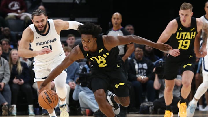 Nov 29, 2023; Memphis, Tennessee, USA; Utah Jazz guard Collin Sexton (2) picks up a loose ball for the steal during the second half against the Memphis Grizzlies at FedExForum. Mandatory Credit: Petre Thomas-Imagn Images
