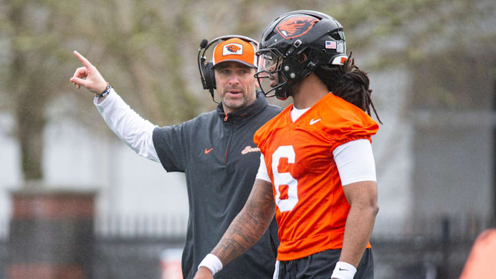 Oregon State offensive coordinator Ryan Gunderson talks with his quarterback Maalik Murphy (6) during the first day of spring practice at the Tommy Prothro Football Complex on Tuesday, March 4, 2025, in Corvallis, Ore.