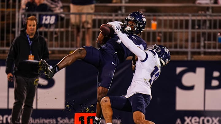 Oct 26, 2024; East Hartford, Connecticut, USA; Connecticut Huskies wide receiver Skyler Bell (1) makes the catch against the Rice Owls the second half at Rentschler Field at Pratt & Whitney Stadium. Mandatory Credit: David Butler II-Imagn Images