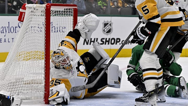 Apr 5, 2025; Dallas, Texas, USA; Pittsburgh Penguins goaltender Tristan Jarry (35) faces the Dallas Stars attack during the second period at the American Airlines Center. Mandatory Credit: Jerome Miron-Imagn Images