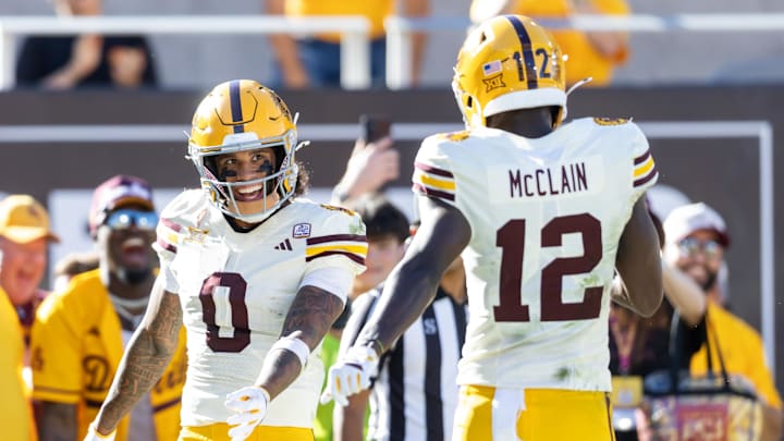 Oct 18, 2025; Tempe, Arizona, USA; Arizona State Sun Devils wide receiver Jordyn Tyson (0) celebrates a touchdown with teammate Malik McClain (12) against the Texas Tech Red Raiders in the second half at Mountain America Stadium. Mandatory Credit: Mark J. Rebilas-Imagn Images Oct 18, 2025; Tempe, Arizona, USA; Arizona State Sun Devils wide receiver Jordyn Tyson (0) celebrates a touchdown with teammate Malik McClain (12) against the Texas Tech Red Raiders in the second half at Mountain America Stadium. Mandatory Credit: Mark J. Rebilas-Imagn Images