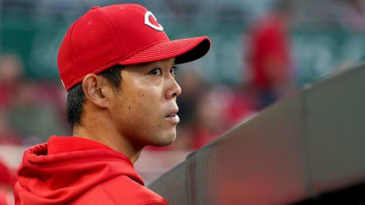 Cincinnati Reds outfielder Shogo Akiyama (4) watches the game from the dugout.