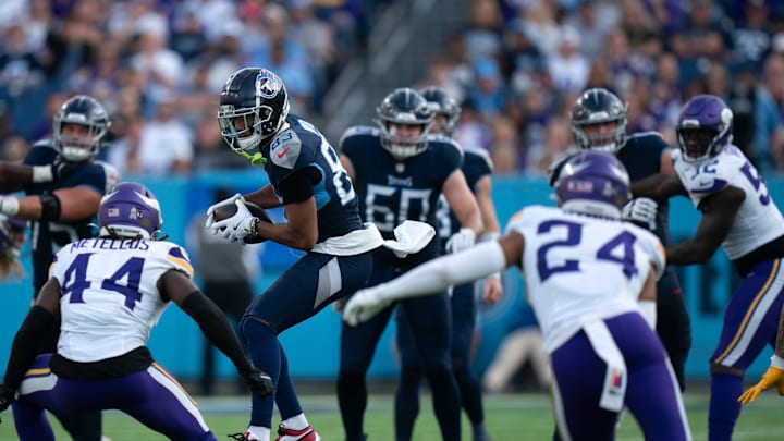 Tennessee Titans wide receiver Tyler Boyd (83) makes a catch in traffic against the Minnesota Vikings at Nissan Stadium in Nashville, Tenn., Sunday, Nov. 17, 2024.