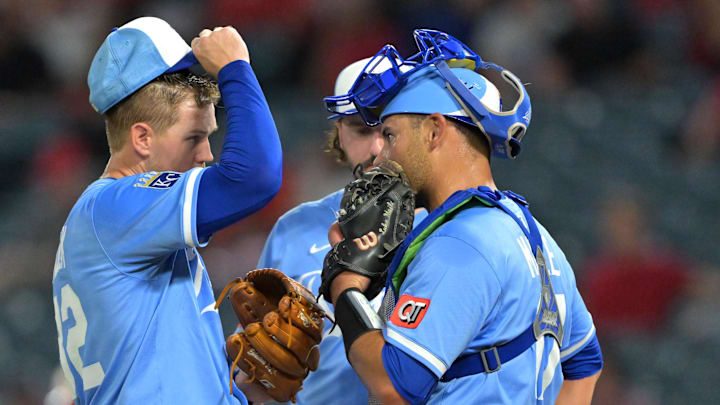 Sep 24, 2025; Anaheim, California, USA;  Kansas City Royals starting pitcher Stephen Kolek (32), first baseman Vinnie Pasquantino (9) and catcher Luke Maile (17) meet at the mound in the third inning against the Los Angeles Angels at Angel Stadium. Mandatory Credit: Jayne Kamin-Oncea-Imagn Images