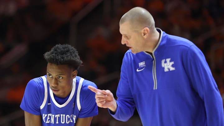 Jan 28, 2025; Knoxville, Tennessee, USA; Kentucky Wildcats head coach Mark Pope speaks with guard Jaxson Robinson (2) during the first half against the Tennessee Volunteers at Thompson-Boling Arena at Food City Center. Mandatory Credit: Randy Sartin-Imagn Images