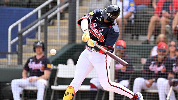 Feb 27, 2026; North Port, Florida, USA; Atlanta Braves designated hitter Jurickson Profar (17) hits a sacrifice fly to drive in a run in the first inning against the Boston Red Sox during spring training at CoolToday Park. Mandatory Credit: Jonathan Dyer-Imagn Images