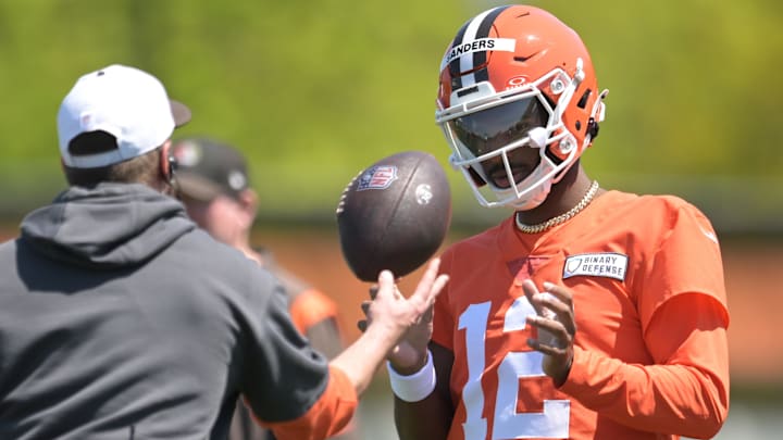 May 10, 2025; Berea, OH, USA; Cleveland Browns quarterback Shedeur Sanders (12) talks to a coach during rookie minicamp at CrossCountry Mortgage Campus. Mandatory Credit: Ken Blaze-Imagn Images