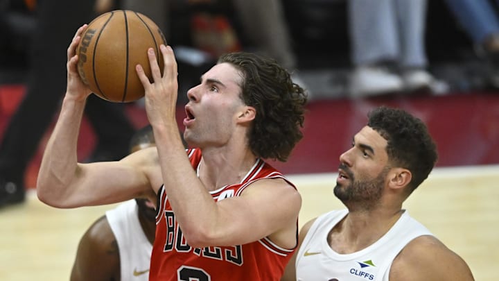 Chicago Bulls guard Josh Giddey (3) and Cleveland Cavaliers forward Georges Niang (20) at Rocket Mortgage FieldHouse. 