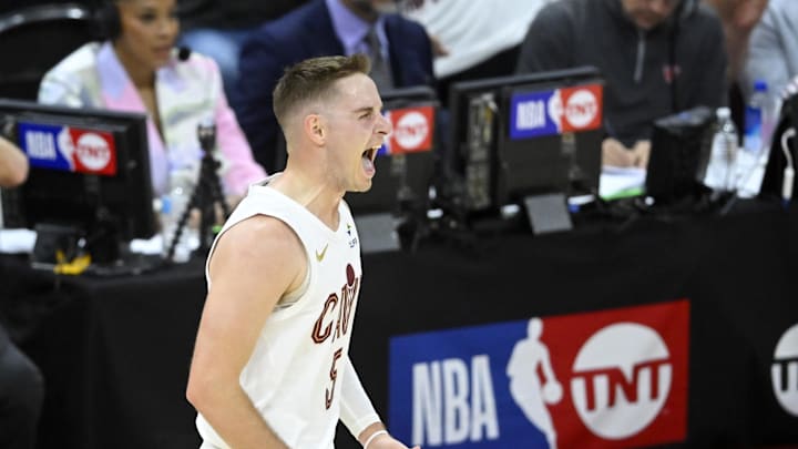 Apr 20, 2025; Cleveland, Ohio, USA; Cleveland Cavaliers guard Sam Merrill (5) celebrates his three-point basket in the fourth quarter against the Miami Heat at Rocket Arena. Mandatory Credit: David Richard-Imagn Images