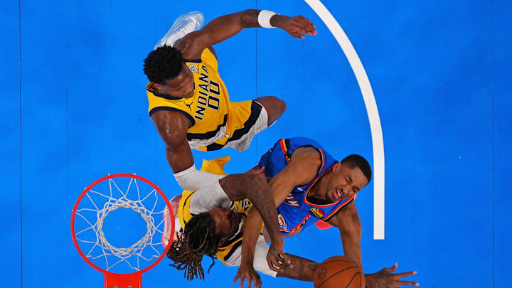 Jun 8, 2025; Oklahoma City, Oklahoma, USA; Oklahoma City Thunder guard Aaron Wiggins (21) shoots the ball against Indiana Pacers forward James Johnson (16) during the second half during game two of the 2025 NBA Finals at Paycom Center. Mandatory Credit: Kyle Terada-Imagn Images