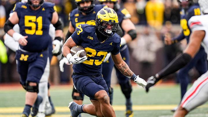 Michigan running back Jordan Marshall (23) runs against Ohio State during the first half at Michigan Stadium in Ann Arbor on Saturday, Nov. 29, 2025. Michigan running back Jordan Marshall (23) runs against Ohio State during the first half at Michigan Stadium in Ann Arbor on Saturday, Nov. 29, 2025.
