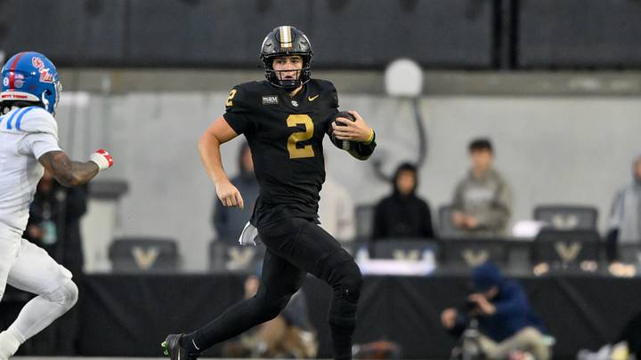 Oct 10, 2026; Nashville, Tennessee, USA; Vanderbilt Commodores quarterback Jared Curtis (2) runs with the ball against the Mississippi Rebels during the second half at FirstBank Stadium. Mandatory Credit: Steve Roberts-Imagn Images Oct 10, 2026; Nashville, Tennessee, USA; Vanderbilt Commodores quarterback Jared Curtis (2) runs with the ball against the Mississippi Rebels during the second half at FirstBank Stadium. Mandatory Credit: Steve Roberts-Imagn Images