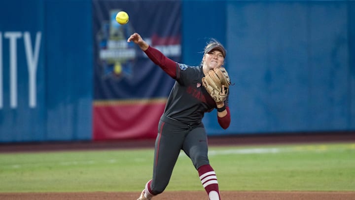 Jun 2, 2024; Oklahoma City, OK, USA; Stanford Cardinals infielder River Mahler (1) throws to first for an out in the third inning against the UCLA Bruins during a Women's College World Series softball losers bracket elimination game at Devon Park. Mandatory Credit: Brett Rojo-Imagn Images Jun 2, 2024; Oklahoma City, OK, USA; Stanford Cardinals infielder River Mahler (1) throws to first for an out in the third inning against the UCLA Bruins during a Women's College World Series softball losers bracket elimination game at Devon Park. Mandatory Credit: Brett Rojo-Imagn Images