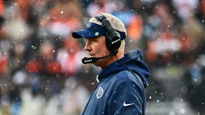 Dec 7, 2025; Cleveland, Ohio, USA; Tennessee Titans interim head coach Mike McCoy watches game play against the Cleveland Browns during the second quarter at Huntington Bank Field. Mandatory Credit: Ken Blaze-Imagn Images