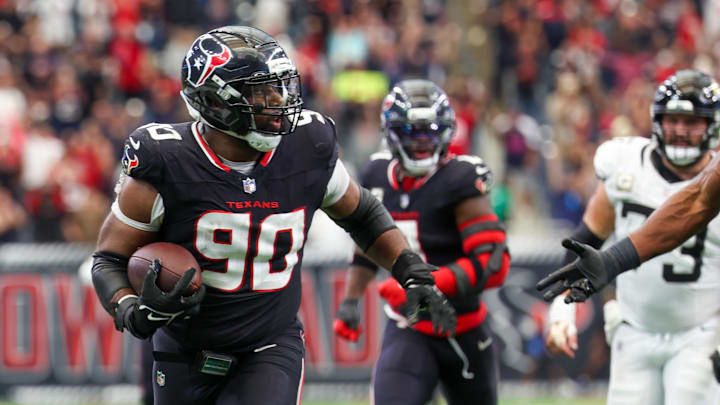 Nov 9, 2025; Houston, Texas, USA; Houston Texans defensive tackle Sheldon Rankins (90) runs for a touchdown after recovering a fumble by the Jacksonville Jaguars during the second half at NRG Stadium. Mandatory Credit: Thomas Shea-Imagn Images Nov 9, 2025; Houston, Texas, USA; Houston Texans defensive tackle Sheldon Rankins (90) runs for a touchdown after recovering a fumble by the Jacksonville Jaguars during the second half at NRG Stadium. Mandatory Credit: Thomas Shea-Imagn Images