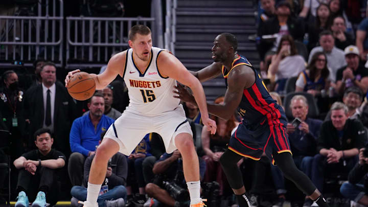 Apr 4, 2025; San Francisco, California, USA; Denver Nuggets center Nikola Jokic (15) is guarded by Golden State Warriors forward Draymond Green (23) in the third period at Chase Center. Mandatory Credit: David Gonzales-Imagn Images Apr 4, 2025; San Francisco, California, USA; Denver Nuggets center Nikola Jokic (15) is guarded by Golden State Warriors forward Draymond Green (23) in the third period at Chase Center. Mandatory Credit: David Gonzales-Imagn Images
