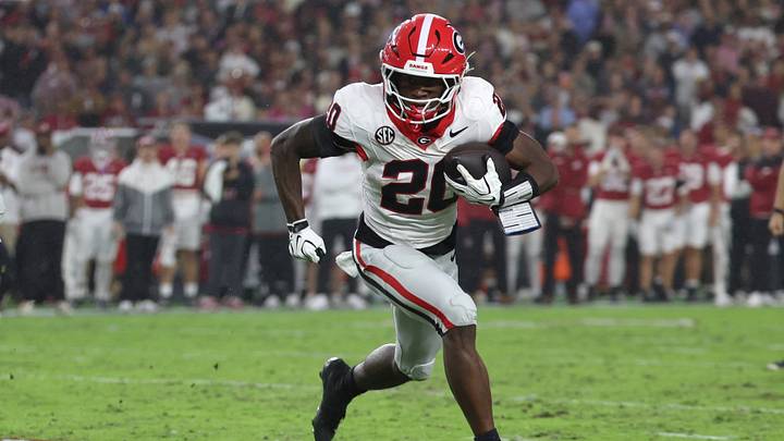 Oct 10, 2026; Tuscaloosa, Alabama, USA; Georgia Bulldogs running back Dwight Phillips Jr. (20) carries the ball against the Alabama Crimson Tide during the first quarter at Saban Field at Bryant-Denny Stadium. Mandatory Credit: David Leong-Imagn Images Oct 10, 2026; Tuscaloosa, Alabama, USA; Georgia Bulldogs running back Dwight Phillips Jr. (20) carries the ball against the Alabama Crimson Tide during the first quarter at Saban Field at Bryant-Denny Stadium. Mandatory Credit: David Leong-Imagn Images