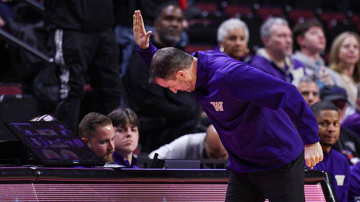 Feb 24, 2026; Piscataway, New Jersey, USA; Washington Huskies head coach Danny Sprinkle slaps the scorers table during the second half against the Rutgers Scarlet Knights at Jersey Mike's Arena. Mandatory Credit: Vincent Carchietta-Imagn Images