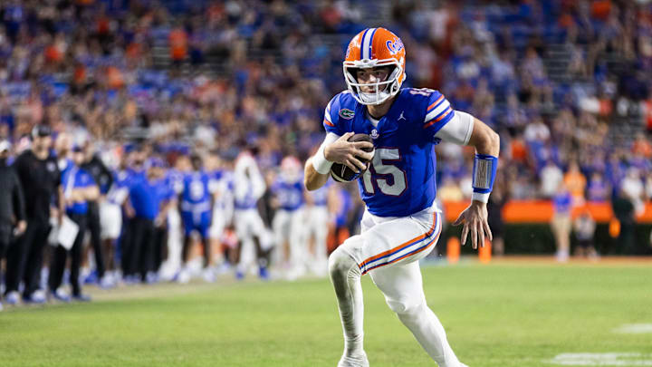 Sep 14, 2024; Gainesville, Florida, USA; Florida Gators quarterback Graham Mertz (15) rushes with the ball against the Texas A&M Aggies during the second half at Ben Hill Griffin Stadium. Mandatory Credit: Matt Pendleton-Imagn Images
