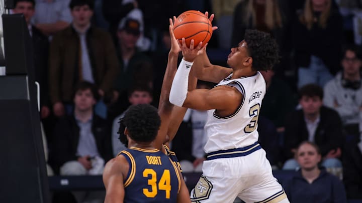Feb 15, 2025; Atlanta, Georgia, USA; Georgia Tech Yellow Jackets guard Jaeden Mustaf (3) shoots against the California Golden Bears in the first half at McCamish Pavilion. Mandatory Credit: Brett Davis-Imagn Images