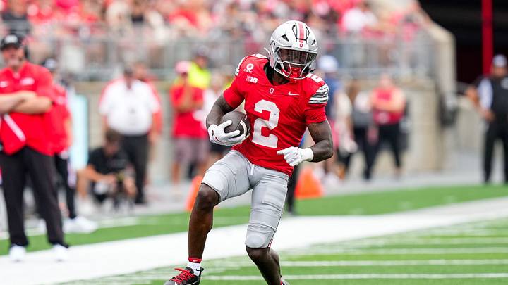 Ohio State Buckeyes running back Legend Bey (2) runs the ball in the second half of the NCAA football game at Ohio Stadium on Sept. 5, 2026 in Columbus, Ohio. Ohio State Buckeyes running back Legend Bey (2) runs the ball in the second half of the NCAA football game at Ohio Stadium on Sept. 5, 2026 in Columbus, Ohio.