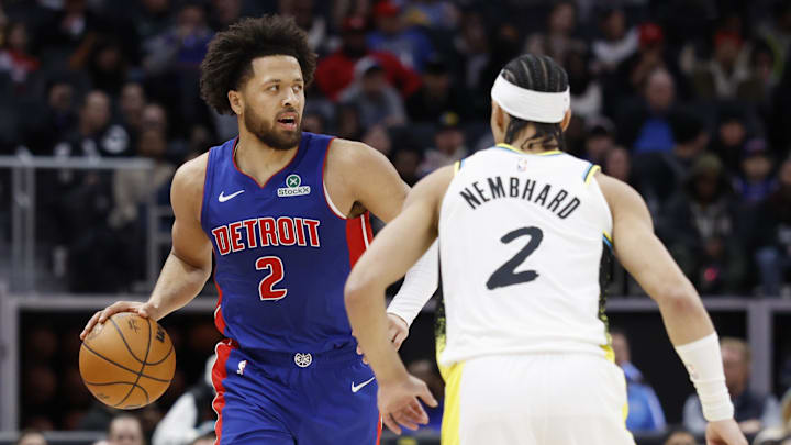 Jan 16, 2025; Detroit, Michigan, USA;  Detroit Pistons guard Cade Cunningham (2) dribbles defended by Indiana Pacers guard Andrew Nembhard (2) in the first half at Little Caesars Arena. Mandatory Credit: Rick Osentoski-Imagn Images