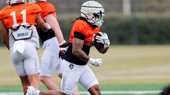 AJ Green (4) runs drills during a Oklahoma State football practice, in Stillwater, Okla., on Tuesday, April 2, 2024. AJ Green (4) runs drills during a Oklahoma State football practice, in Stillwater, Okla., on Tuesday, April 2, 2024.