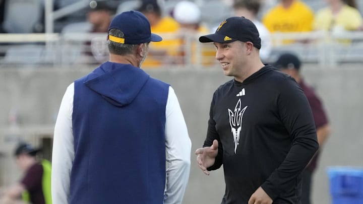Northern Arizona Lumberjacks head coach Brian Wright talks to Arizona State Sun Devils head coach Kenny Dillingham before a football game at Mountain America Stadium in Tempe on Aug. 30, 2025.