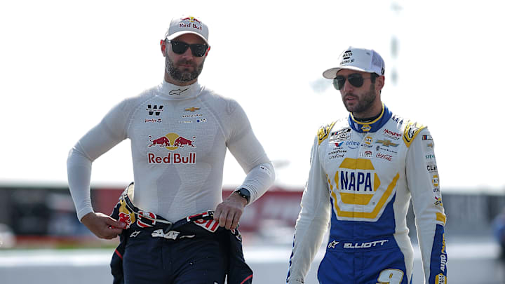 SONOMA, CALIFORNIA - JULY 12: Shane Van Gisbergen, driver of the #88 Red Bull Chevrolet, (L) and Chase Elliott, driver of the #9 NAPA Auto Parts Chevrolet, walk the grid during practice for the NASCAR Cup Series Toyota/Save Mart 350 at Sonoma Raceway on July 12, 2025 in Sonoma, California.