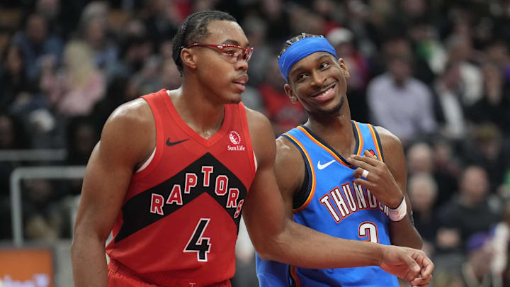 Dec 5, 2024; Toronto, Ontario, CAN; Toronto Raptors forward Scottie Barnes (4) and Oklahoma City Thunder guard Shai Gilgeous-Alexander (2) smile before a free throw during the second half at Scotiabank Arena. Mandatory Credit: John E. Sokolowski-Imagn Images