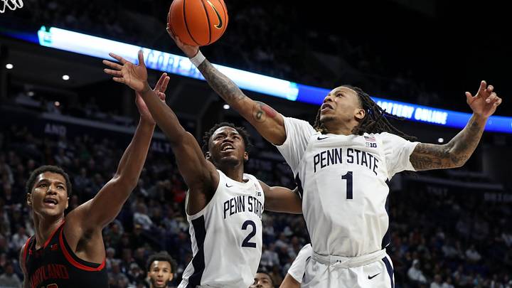 Penn State Nittany Lions guard Ace Baldwin Jr. (1) reaches for the rebound during the second half against the Maryland Terrapins at Bryce Jordan Center. Penn State Nittany Lions guard Ace Baldwin Jr. (1) reaches for the rebound during the second half against the Maryland Terrapins at Bryce Jordan Center.