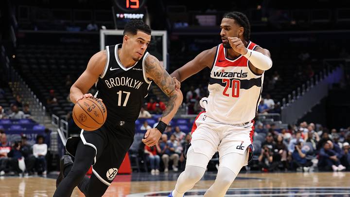 Oct 12, 2026; Washington, District of Columbia, USA; Brooklyn Nets forward Michael Porter Jr. (17) drives to the basket as Washington Wizards center Alex Sarr (20) defends in the first half at Capital One Arena. Mandatory Credit: Geoff Burke-Imagn Images