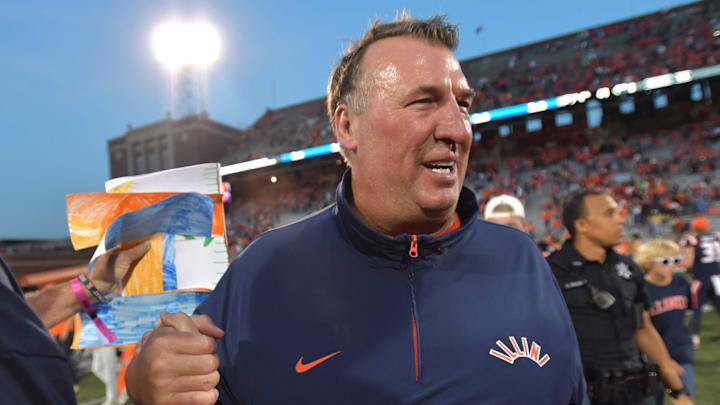 Oct 12, 2024; Champaign, Illinois, USA; Illinois Fighting Illini head coach Bret Bielema celebrates a 50-49 win over the Purdue Boilermakers at Memorial Stadium. Mandatory Credit: Ron Johnson-Imagn Images