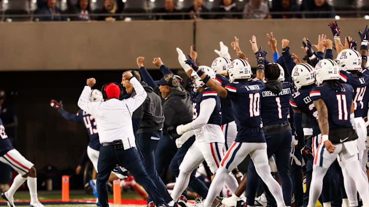 Nov 15, 2024; Tucson, Arizona, USA; Arizona Wildcats head coach Brent Brennan celebrates with Arizona Wildcats team during the second quarter against the Houston Cougars at Arizona Stadium. Mandatory Credit: Aryanna Frank-Imagn Images