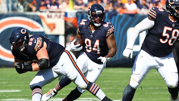 Oct 1, 2023; Chicago, Illinois, USA; Chicago Bears tight end Marcedes Lewis (84) makes a catch against the Denver Broncos during the second half at Soldier Field. Mandatory Credit: Mike Dinovo-Imagn Images