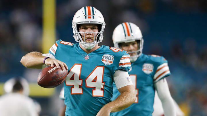 Miami Dolphins long snapper Blake Ferguson (44) walks on the field prior to the game against the Pittsburgh Steelers at Hard Rock Stadium.