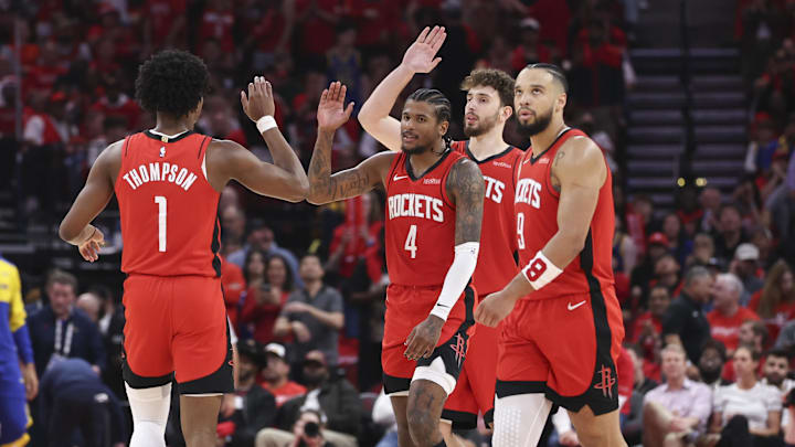 Apr 23, 2025; Houston, Texas, USA; Houston Rockets guard Jalen Green (4) and forward Amen Thompson (1) react after a play during the fourth quarter during game two of the first round for the 2024 NBA Playoffs against the Golden State Warriors at Toyota Center. Mandatory Credit: Troy Taormina-Imagn Images