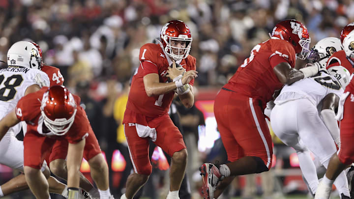 Sep 12, 2025; Houston, Texas, USA; Houston Cougars quarterback Conner Weigman (1) runs with the ball during the second quarter against the Colorado Buffaloes at TDECU Stadium. Mandatory Credit: Troy Taormina-Imagn Images