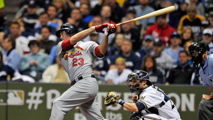 Oct 16, 2011; Milwaukee, WI, USA; St. Louis Cardinals third baseman David Freese hits a double in the third inning of game six of the 2011 NLCS against the Milwaukee Brewers at Miller Park. Mandatory Credit: Jeff Curry-USA TODAY Sports